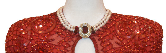 The shoulders and bejeweled neckline of the Rhonda Walters inaugural ballgown. The dress has beautifully patterned beading and sequins.